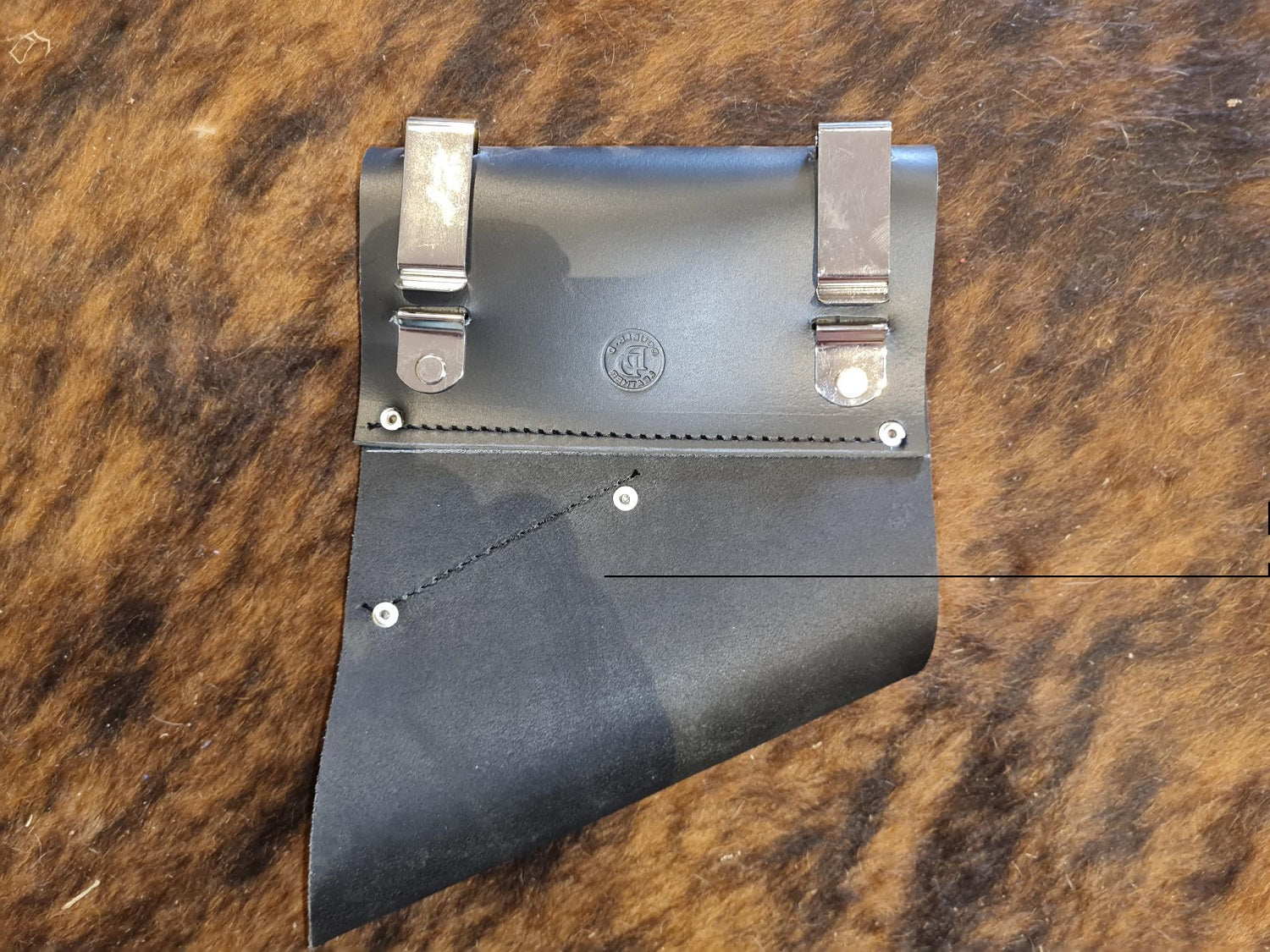 Angled full leather pick holder